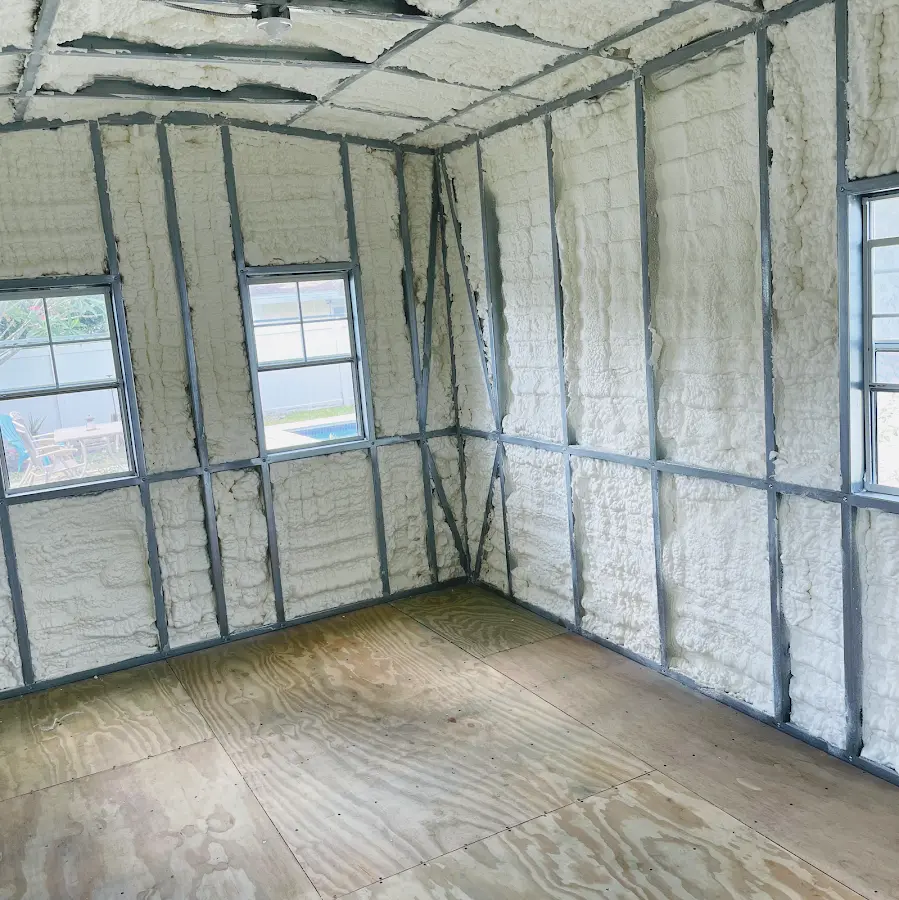 Closed-cell spray foam insulation applied to wall cavities in a residential project in Nederland
